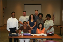 Shyam and the PreGED Math class celebrate their successes.